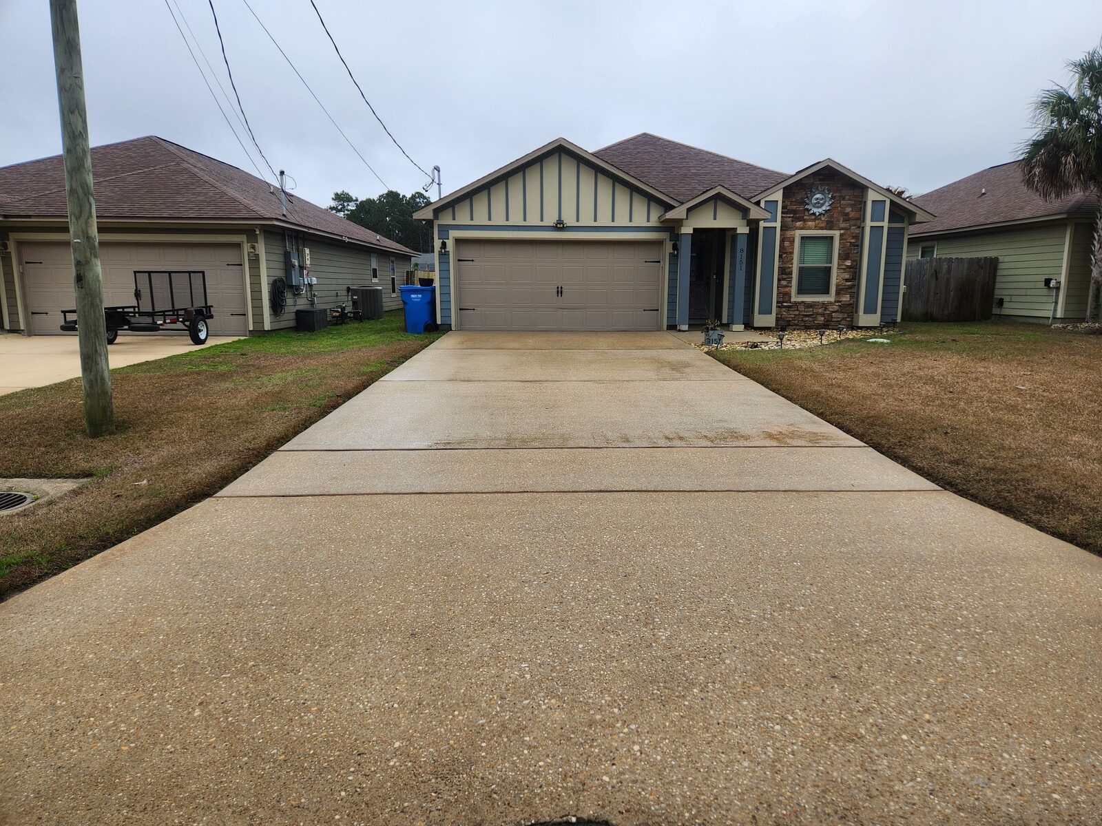 Power Washing in Navarre, FL driveway cleaning project photo