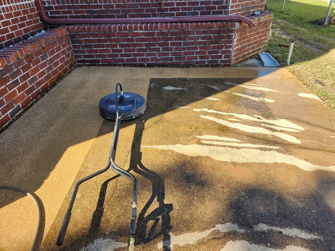 Power Washing in Navarre, FL driveway cleaning project photo